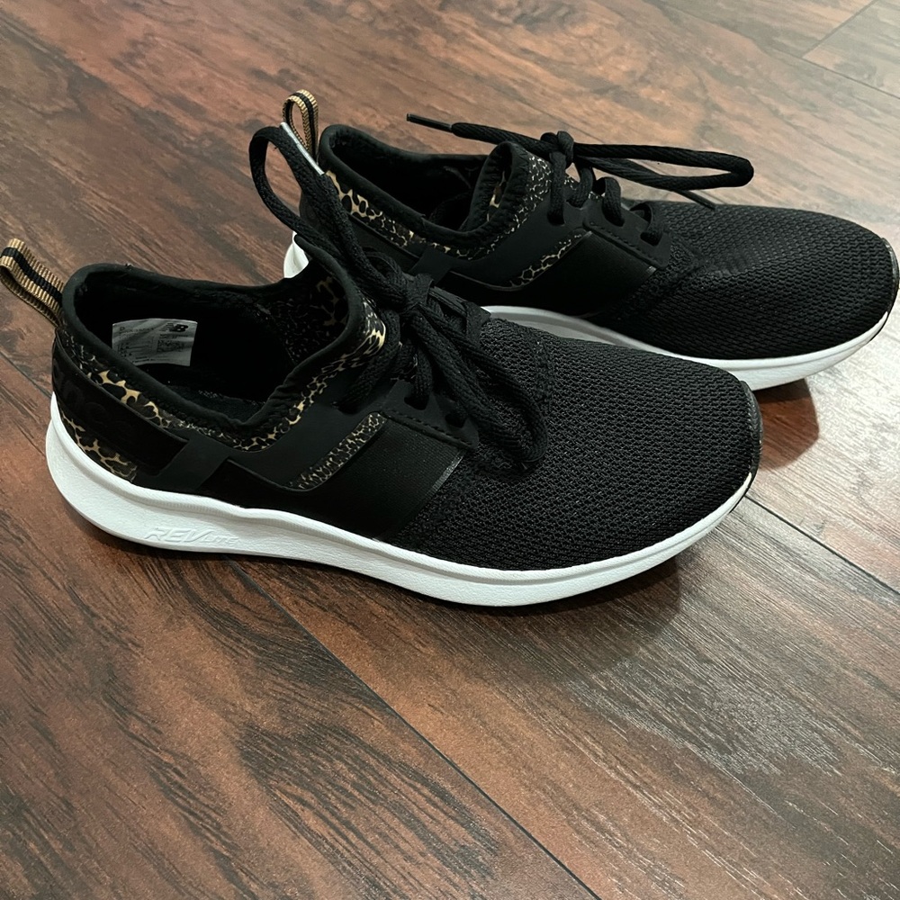 New Balance Black and White Women's Athletic Sneakers with Leopard Trim